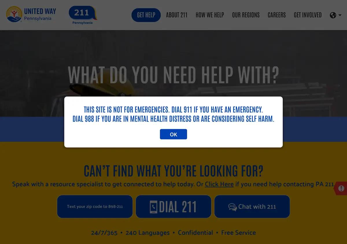 The PA 211 homepage with dial, text, and search options.