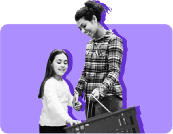 pre-teen daughter with mother holding a grocery shopping basket