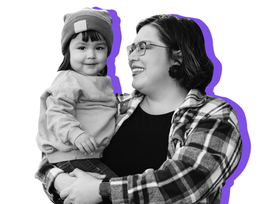 A woman holds her daughter on her hip against a purple background. Parents looking for free Halloween costumes this year have several options.