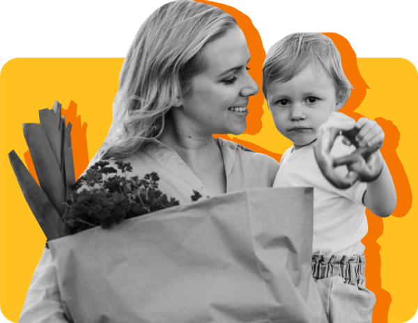 A mom shops for groceries with her toddler 
