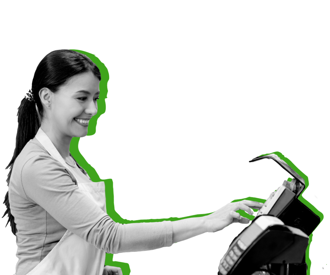 A woman rings up groceries against a green background.