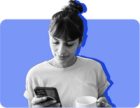 A woman checks her online SNAP portal on her phone while holding a mug against a blue background.