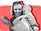 A mother holds baby while they shop for formula using SNAP benefits against a red background.
