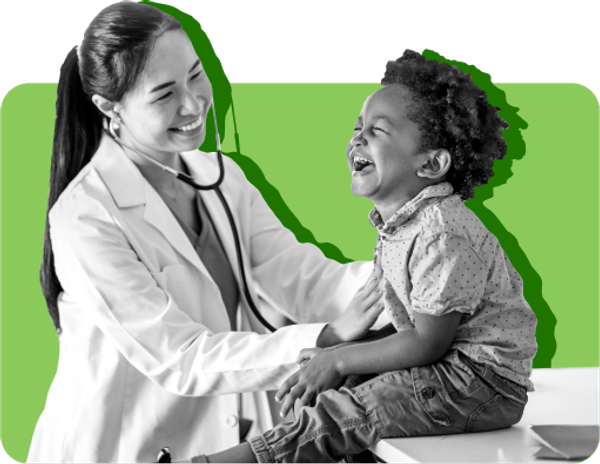 A doctor examines a young patient against a green background. 