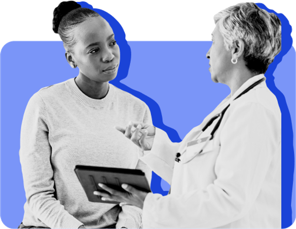 A doctor explains Medicaid changes to a patient against a blue background.