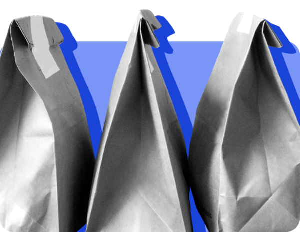 Takeout bags against a blue background.