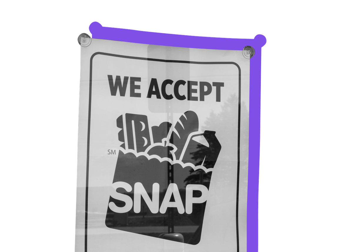 A sign that would go on a grocery store window that says "we accept SNAP"