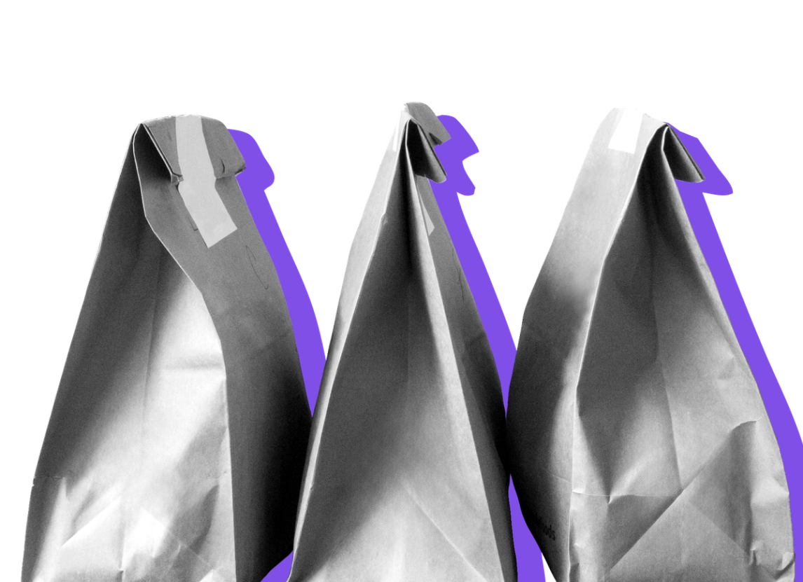 Image showing paper bags of grocery delivery against a purple background