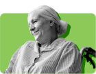 A woman on Medicaid and Medicare sits in a wheelchair against a green background.