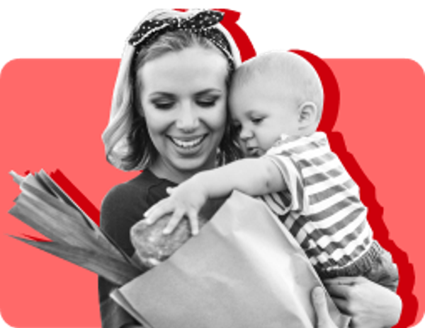 mom holding grocery bag and toddler