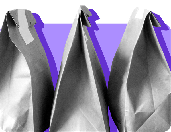 Image showing paper bags of grocery deliveries against a purple background