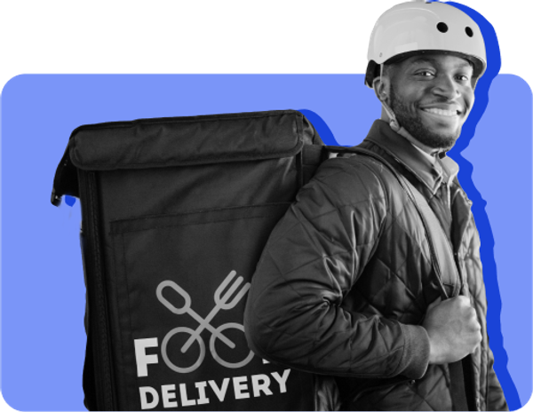 A delivery guy with an insulated bag and a bike helmet on stands in front of a blue background