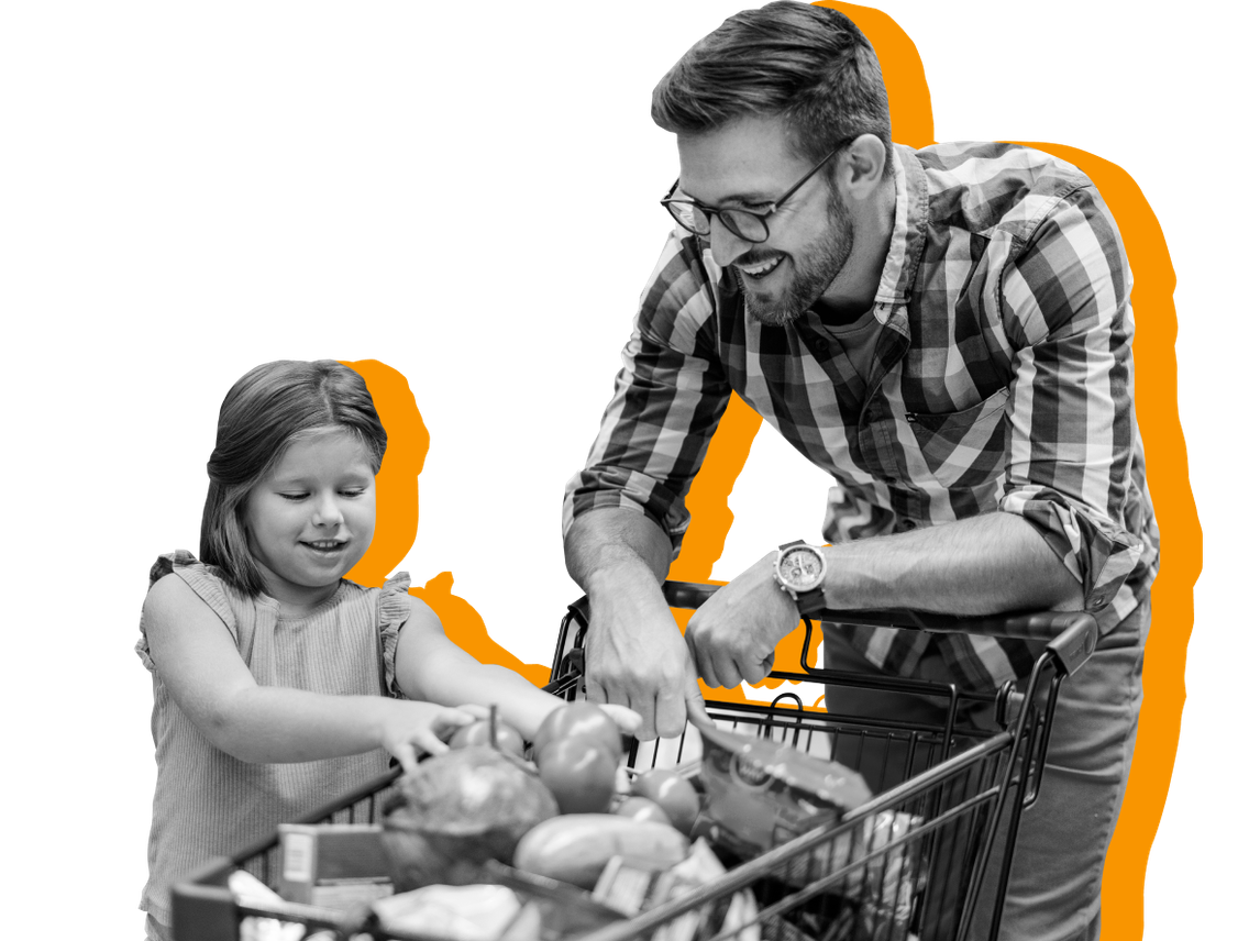 A father and daughter shop for groceries 