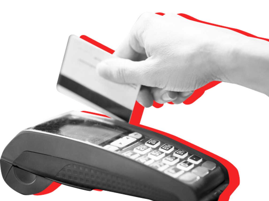 hand swiping credit card through reader