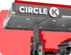 The exterior of a Circle K location pictured against a red background.