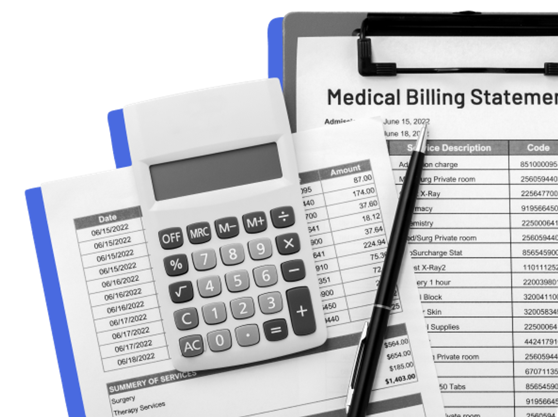 calculator and pen with medical bill paperwork
