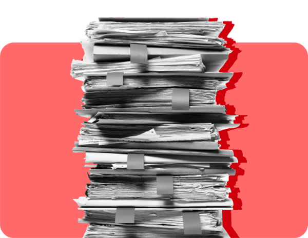 A stack of paper documents and folders against a red background