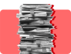 A stack of paper documents and folders against a red background