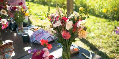 Multiple bouquets lined up on a table for comparison — service evaluation