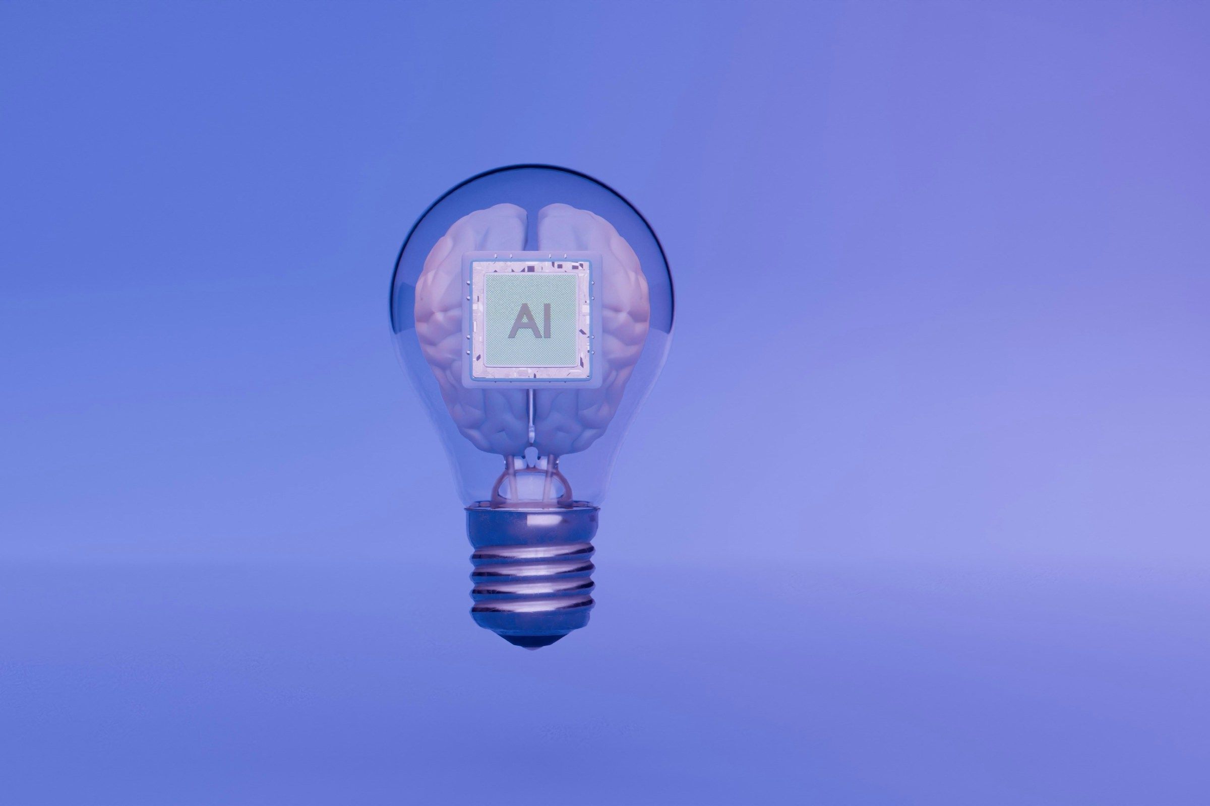 Artificial intelligence is represented by the lightbulb and brain.