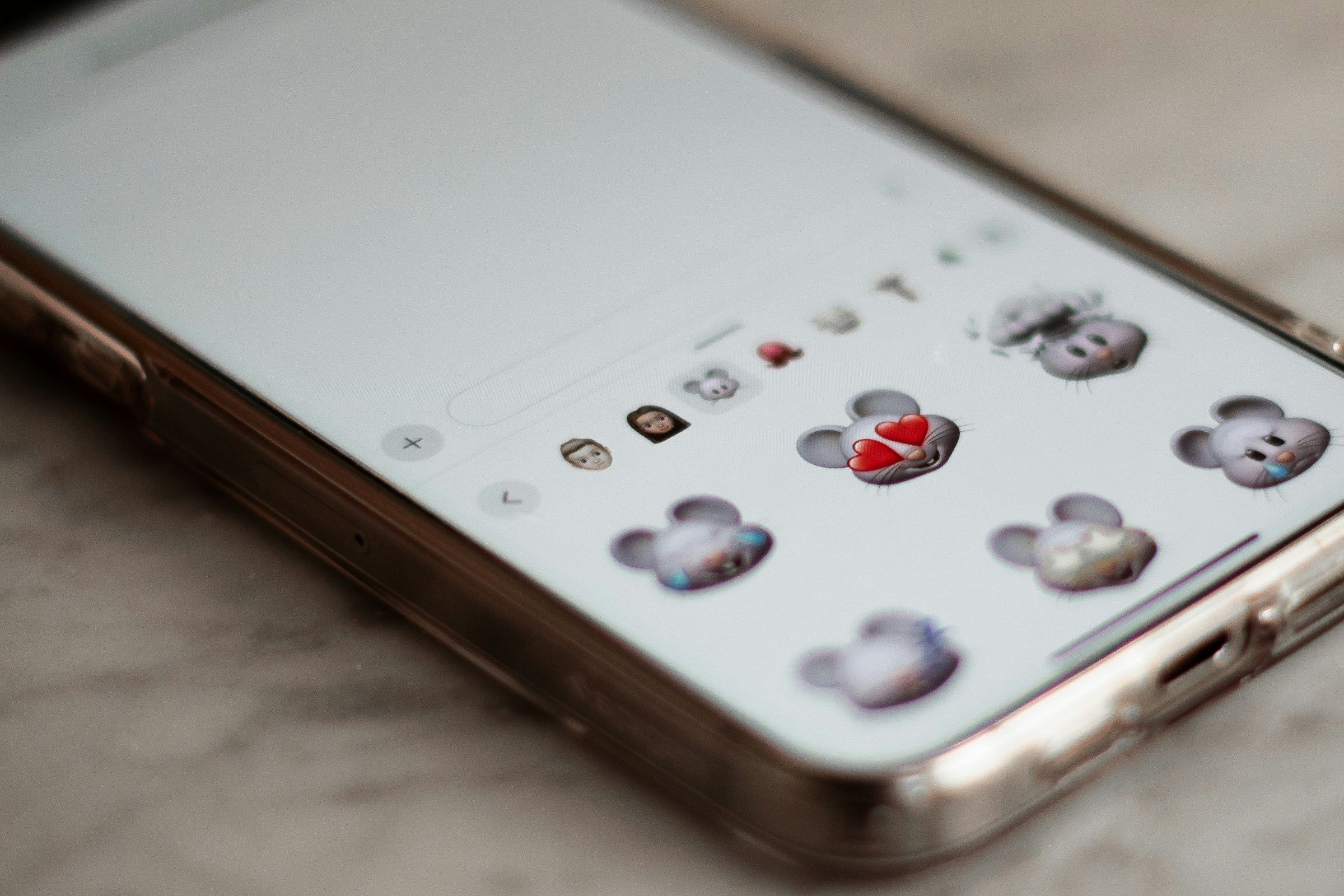 Smartphone screen displaying chat with AI virtual influencers and subscription icons