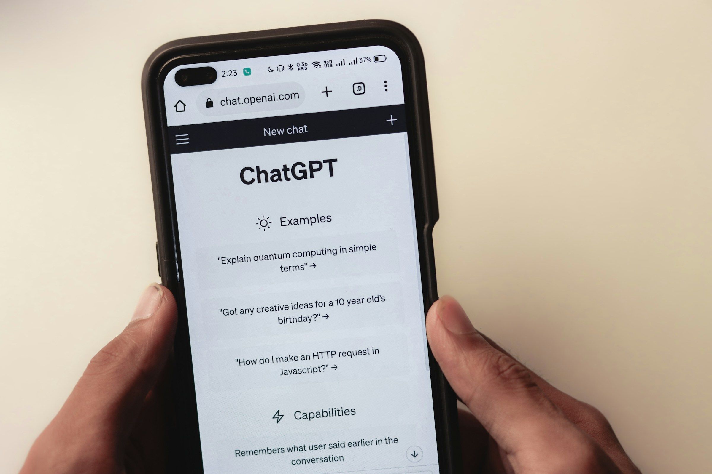 Smartphone displaying subscription chat UI for an AI virtual creator platform