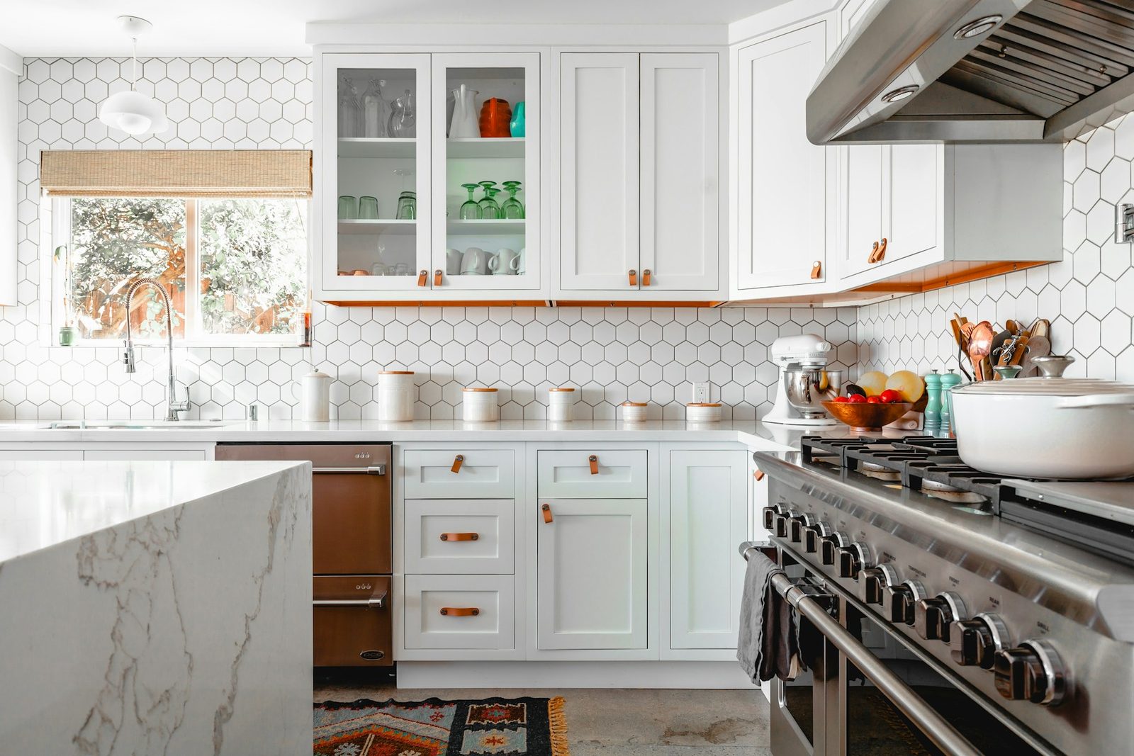 Neutral kitchen with warm wood cabinetry and shoppable accents