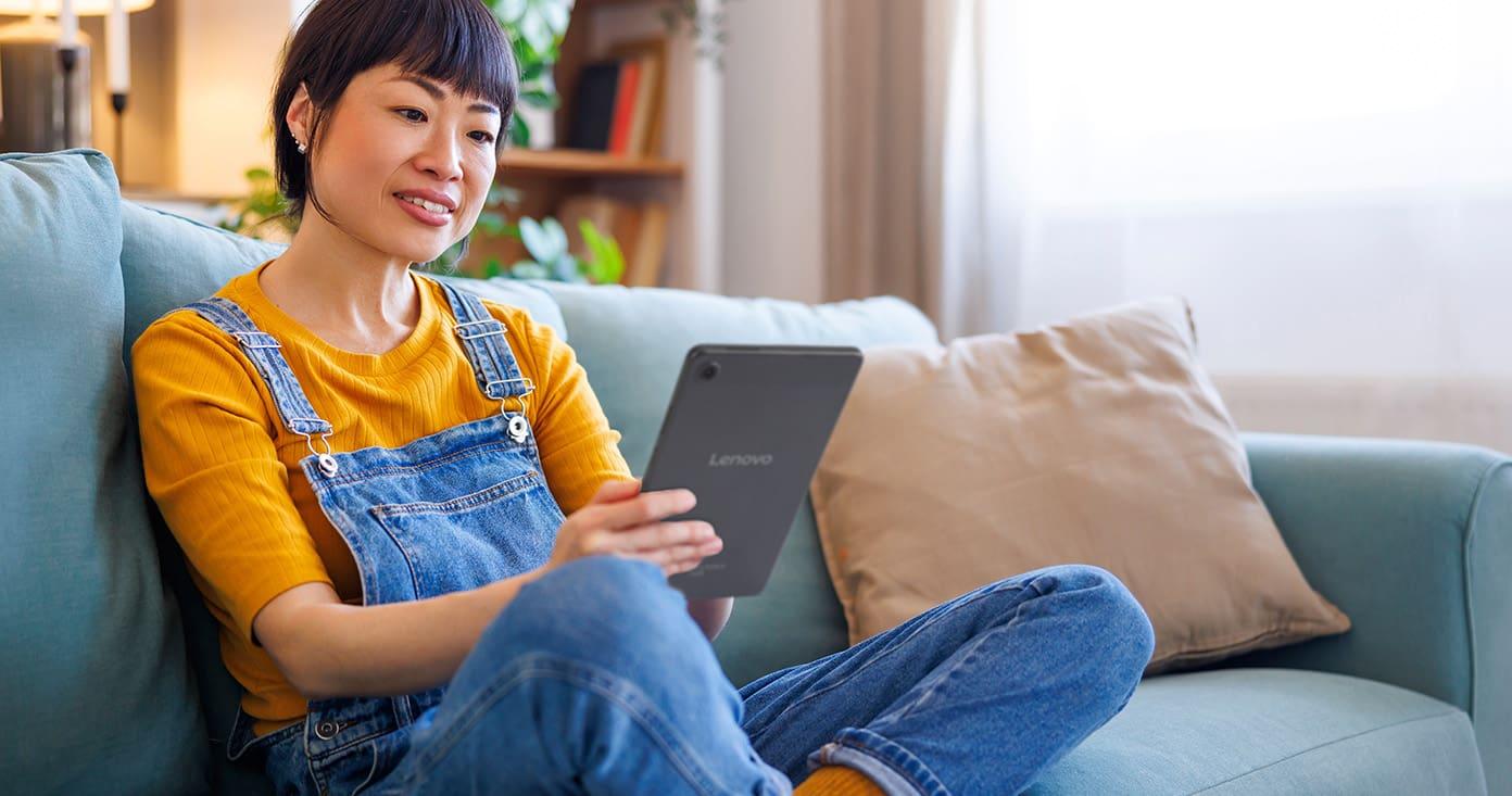Woman Reading NOOK Reading Tablet in Luna Grey