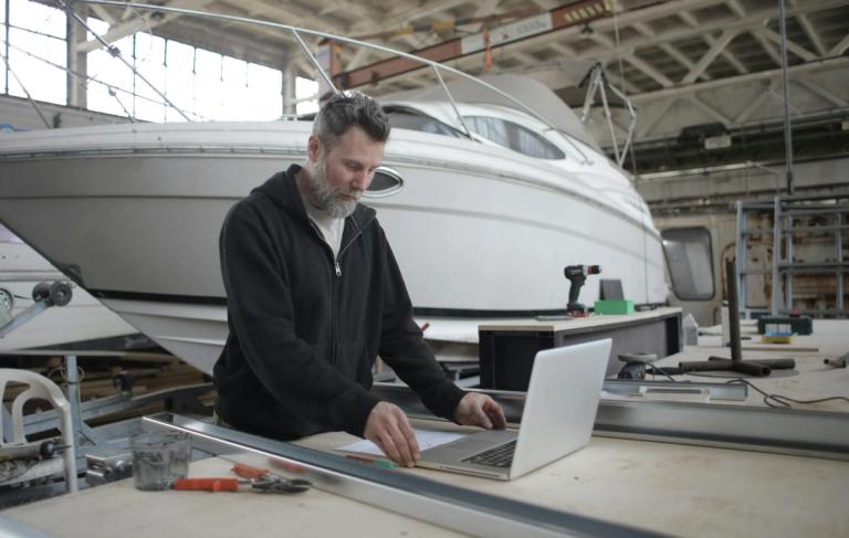 a calendar with seasonal boat maintenance tasks highlighted, emphasizing year-round care