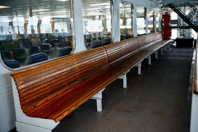 the interior of a jon boat showcasing storage and comfortable seats, highlighting essential features