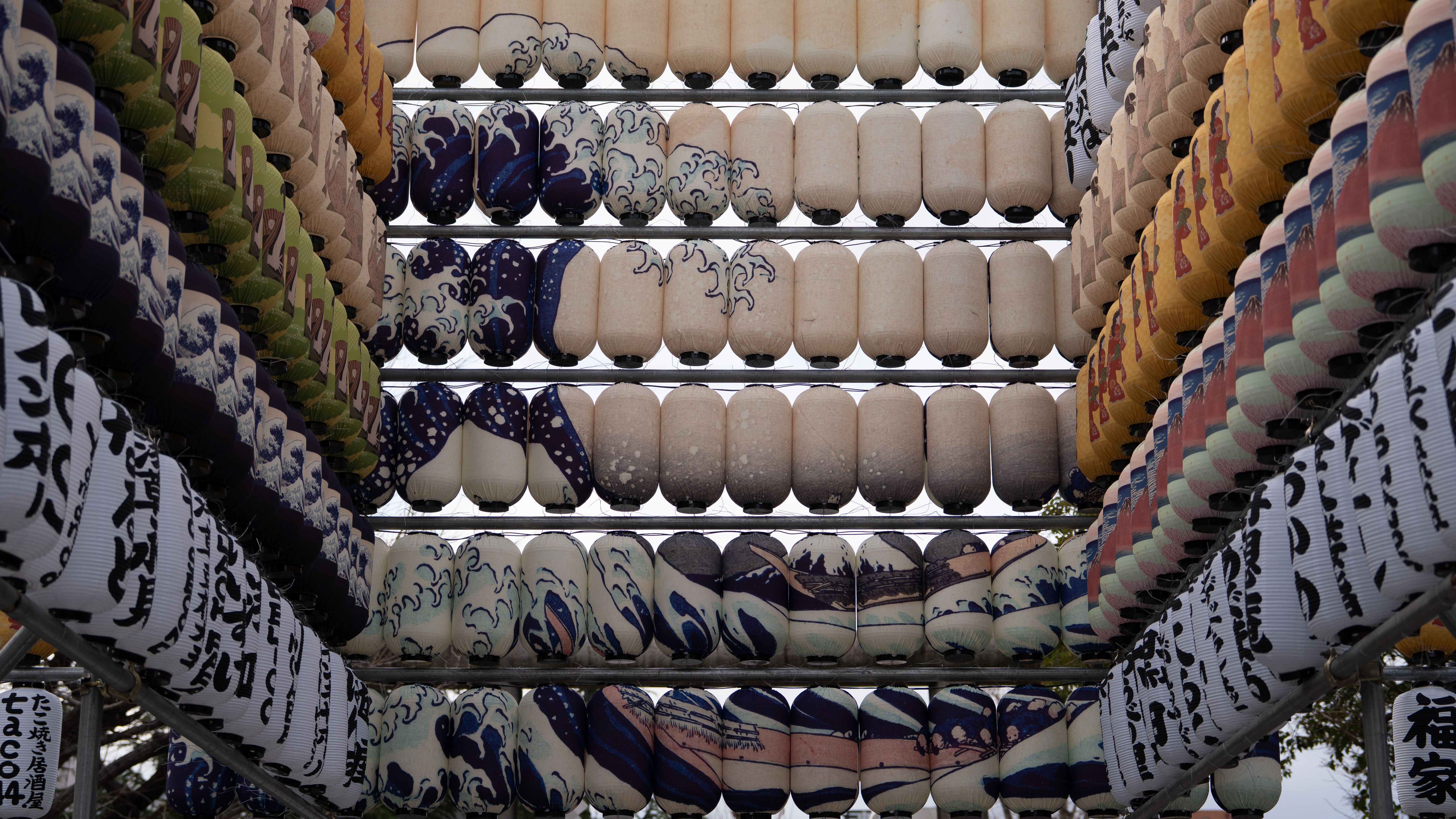 Hokusai's masterpieces wrapped around traditional paper lanterns