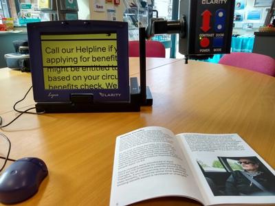 Project: RNIB, Hanley. Cover photo: A video magnifier with an open book