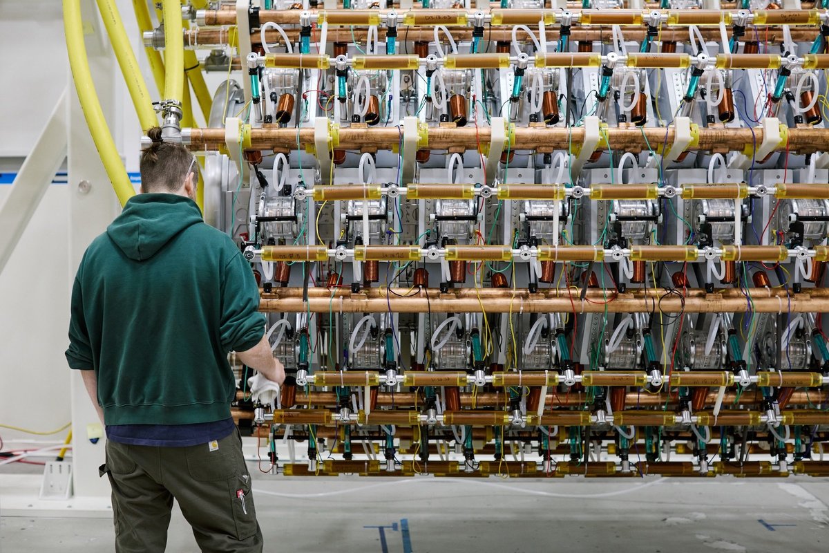 Close-up of the Pacific Fusion scaled pulser-module prototype, showing stacked electrical stages and cabling.