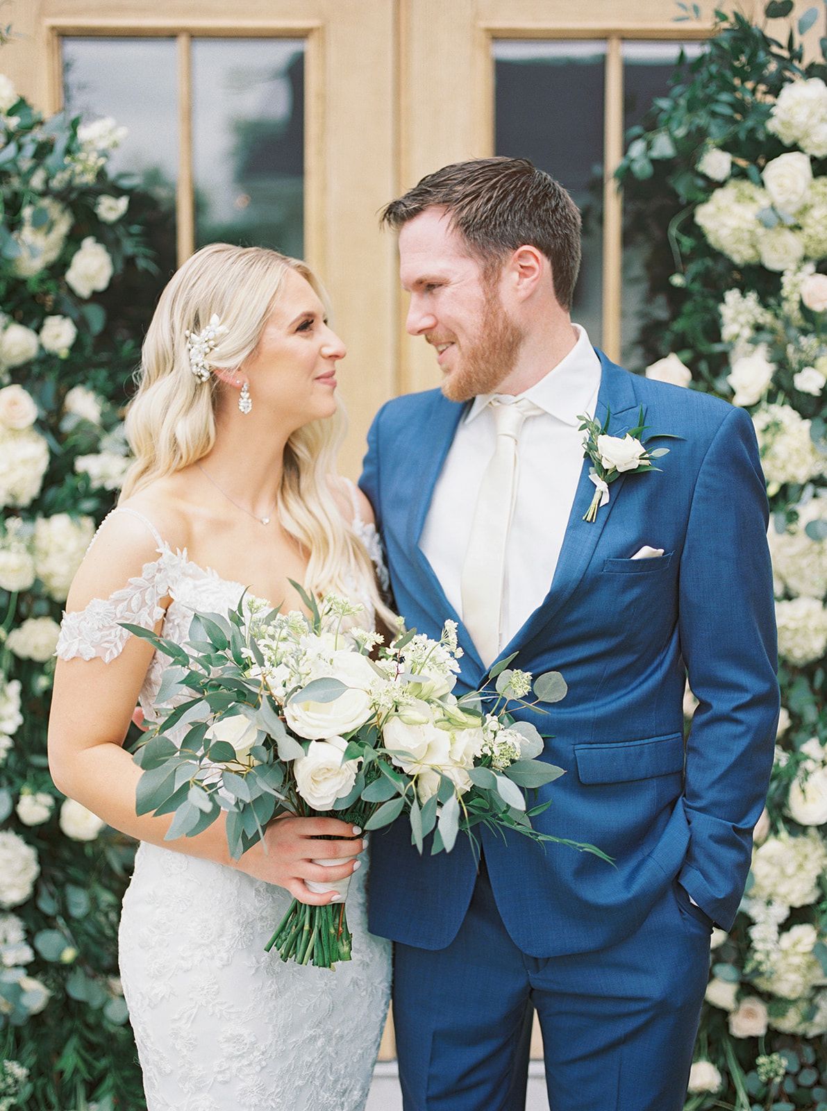 Bride and Groom in blue suit