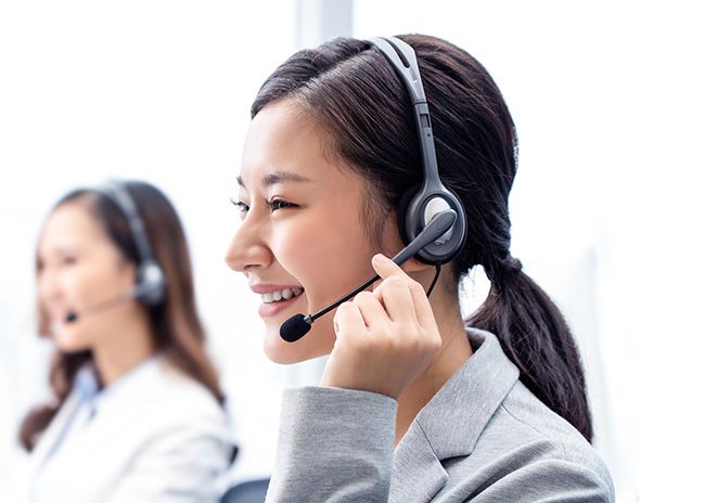 A woman wearing a headset