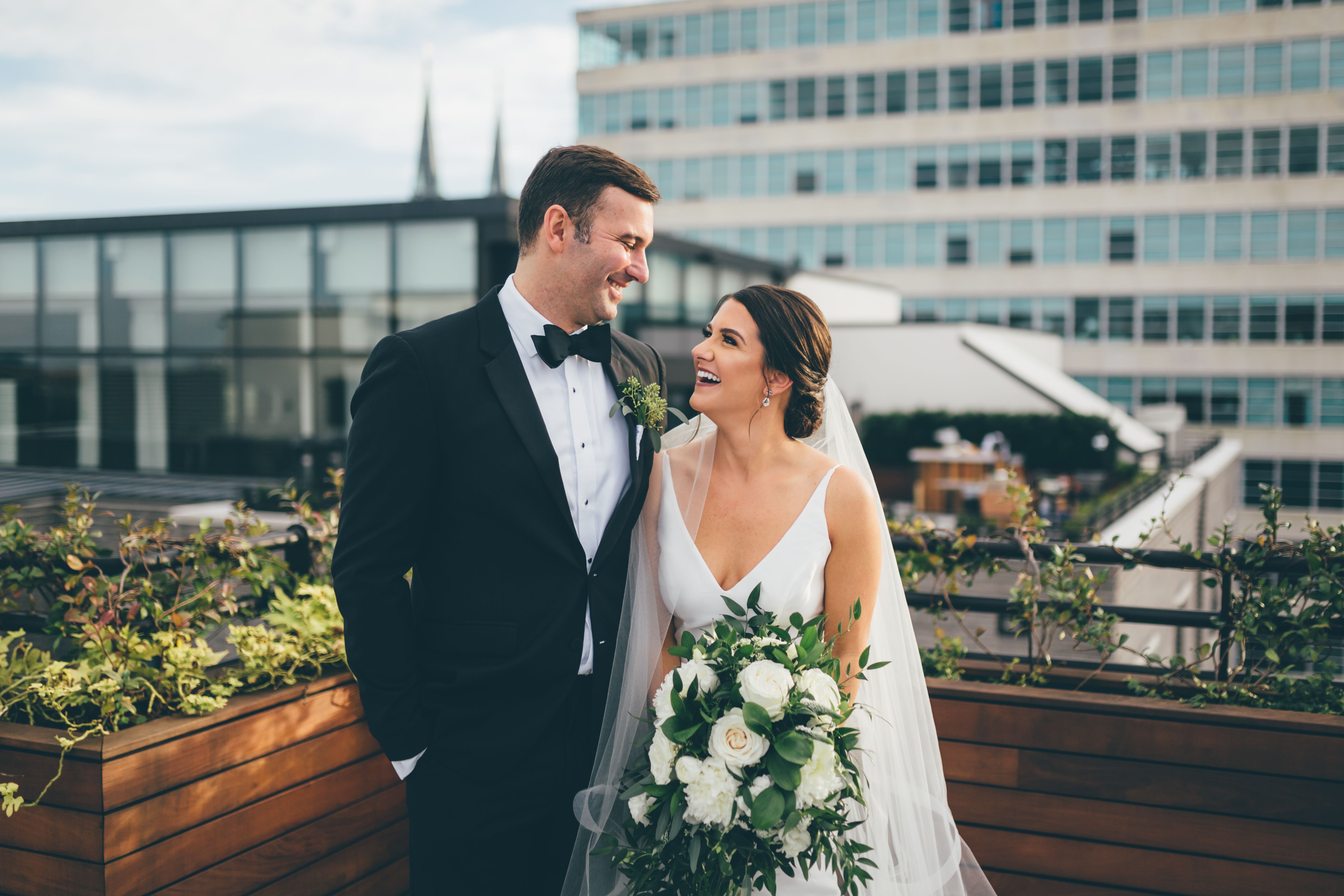Bride and Groom in black tuxedo