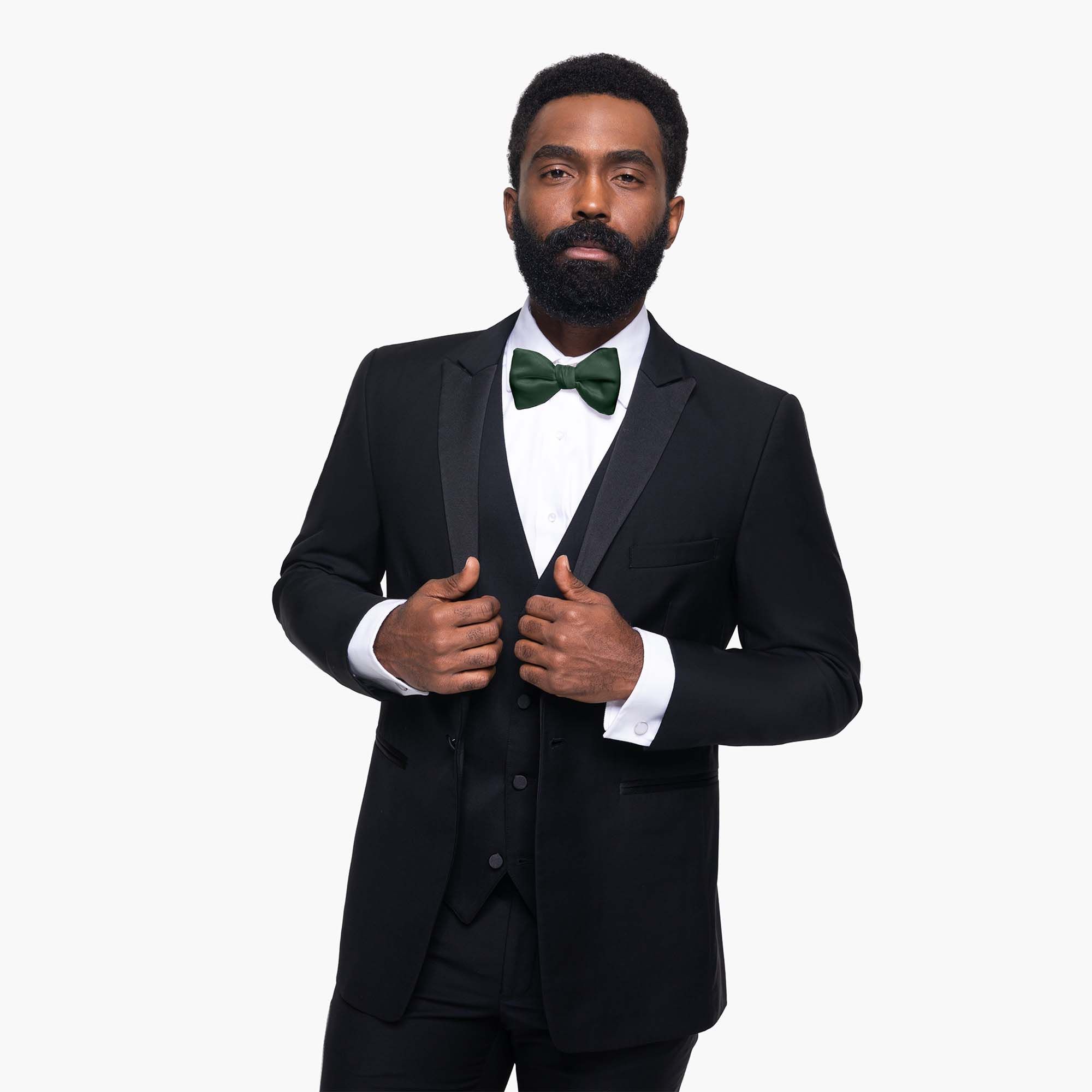 A man wearing our Black Peak Lapel Tuxedo