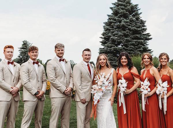 Real wedding, groom in a British Tan suit