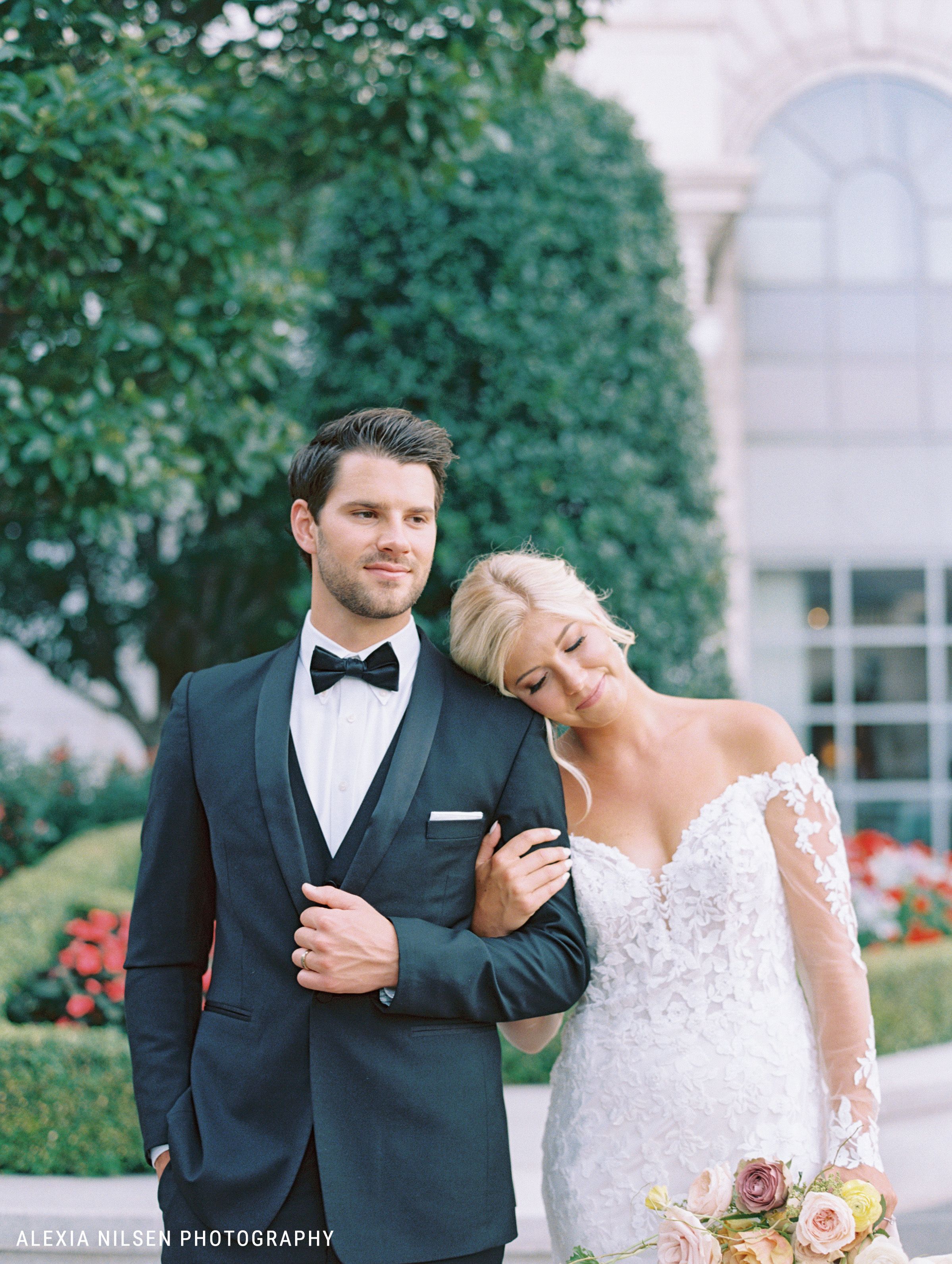 Bride and Groom wearing black tuxedo 