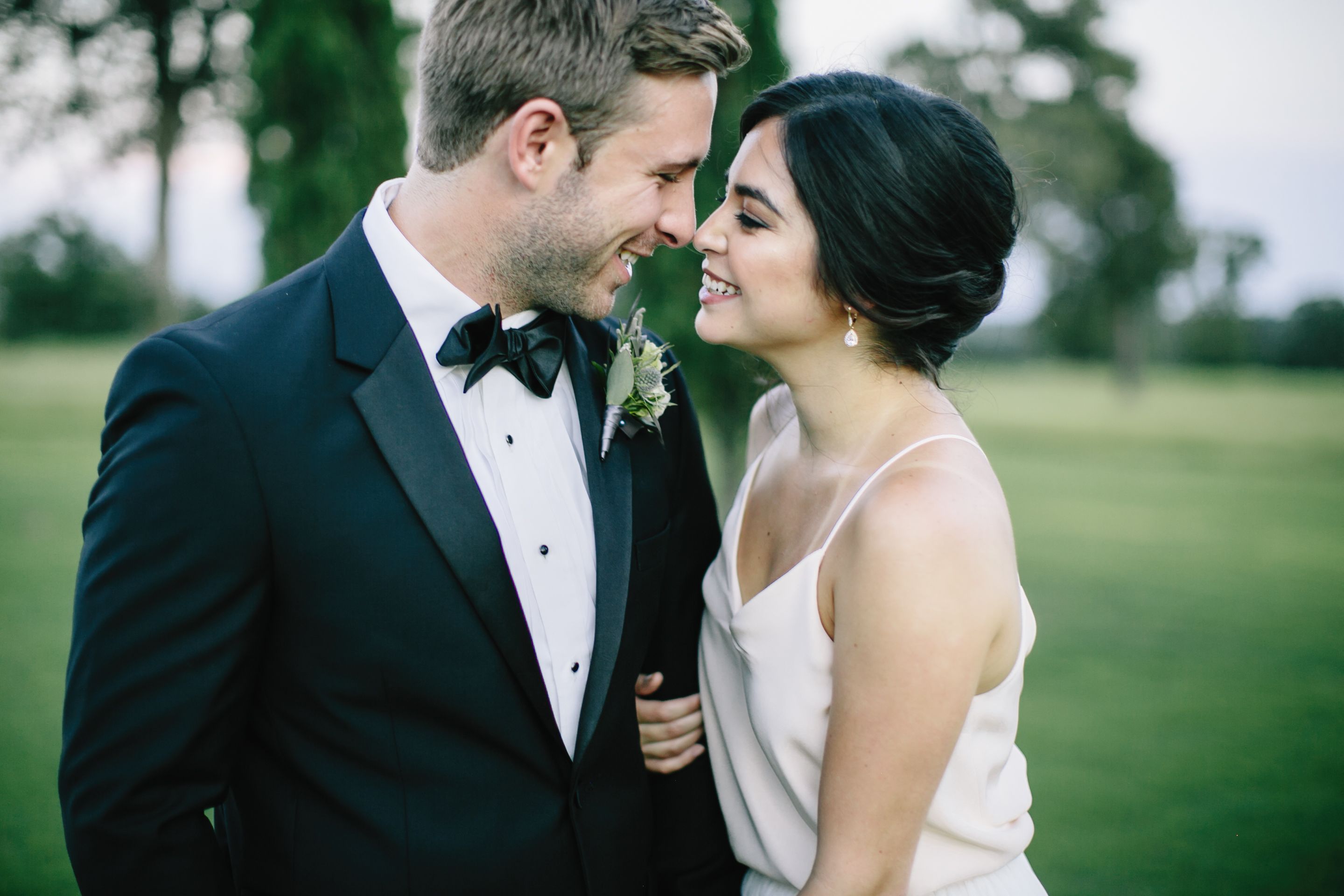 Bride and Groom in black tuxedo