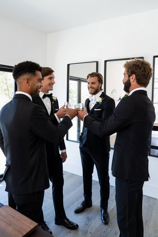 Real wedding, grooms and groomsmen in Generation Tux suits