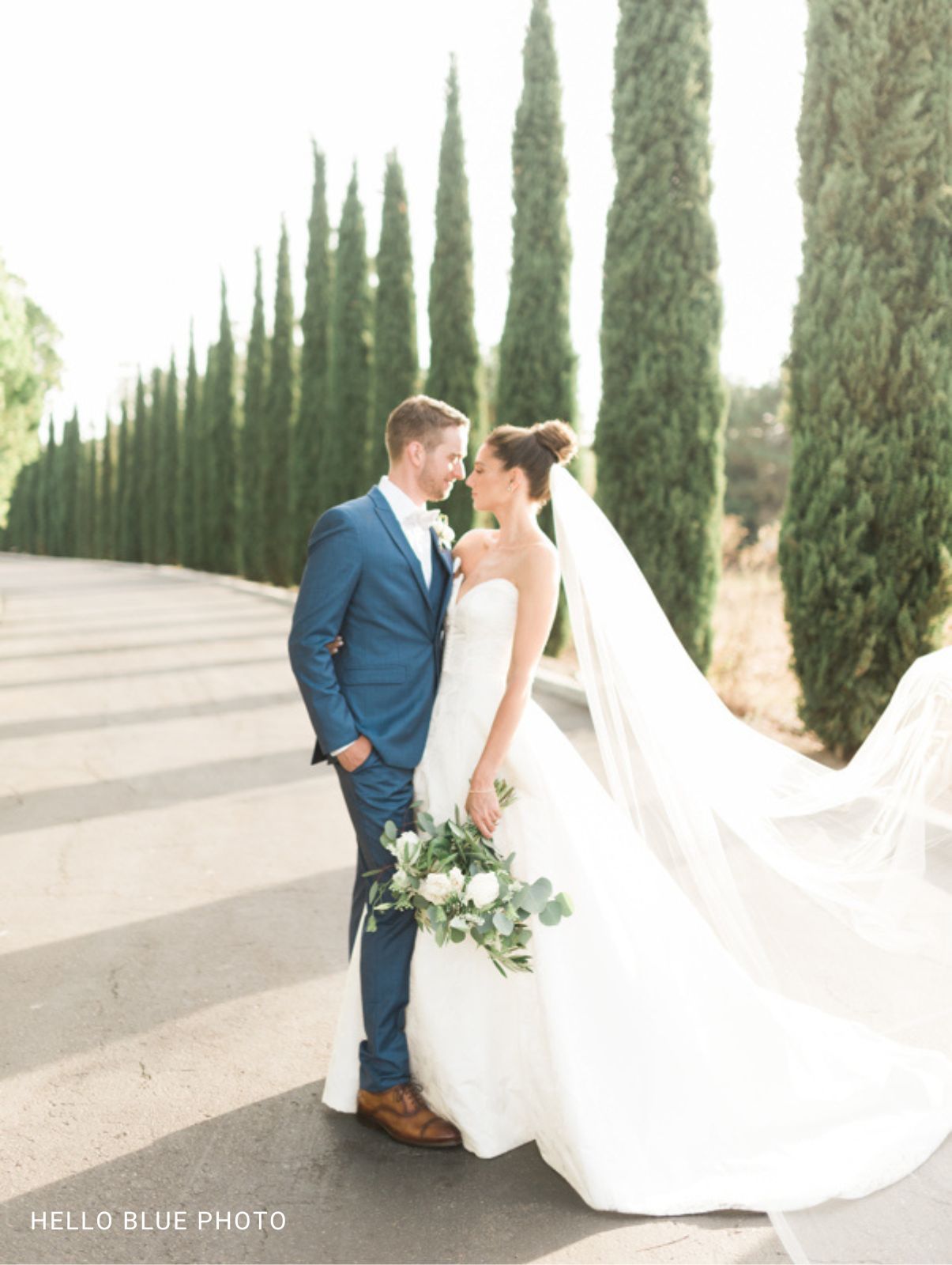 Groom in Blue suit with Bride