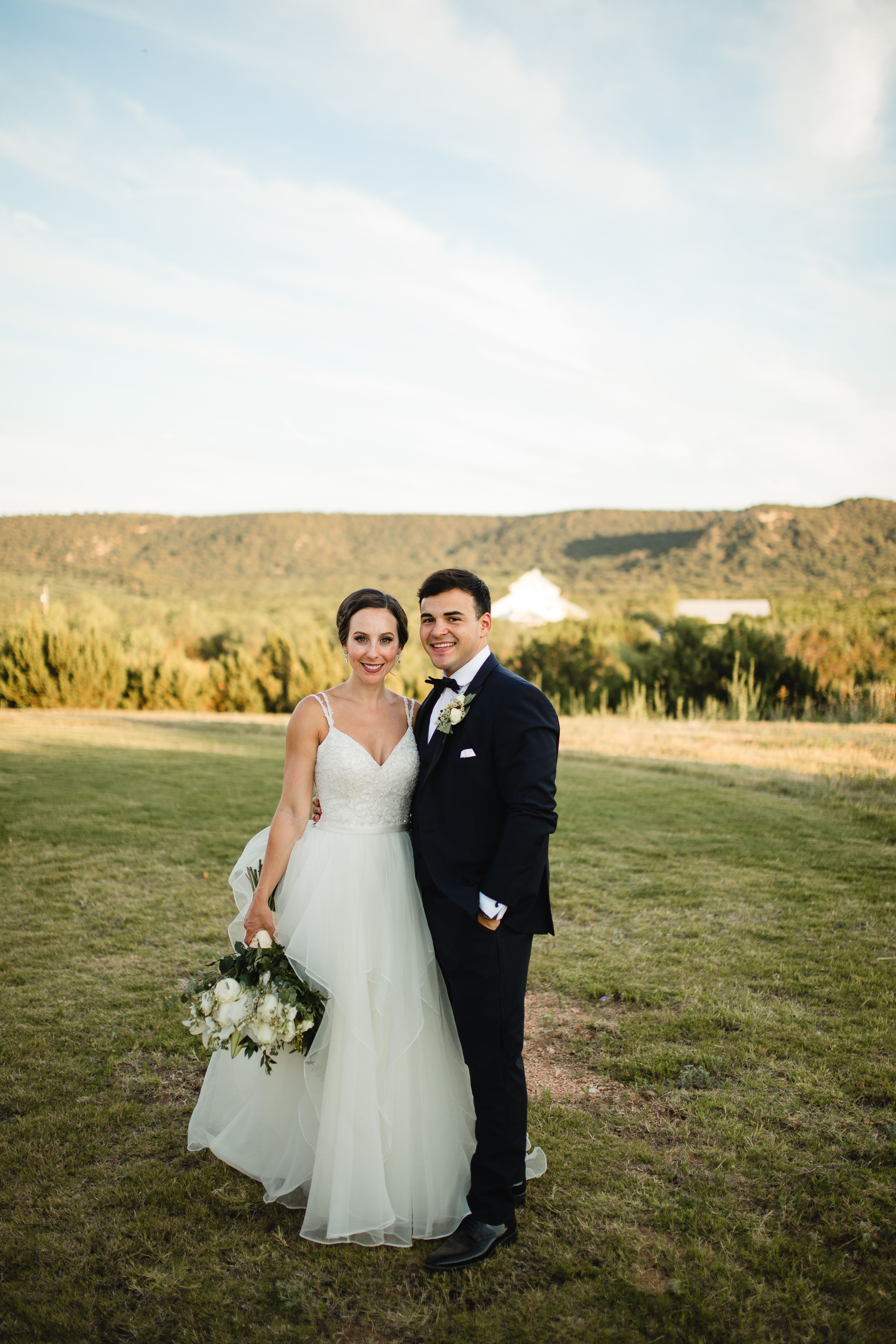 Bride and Groom in black tuxedo 