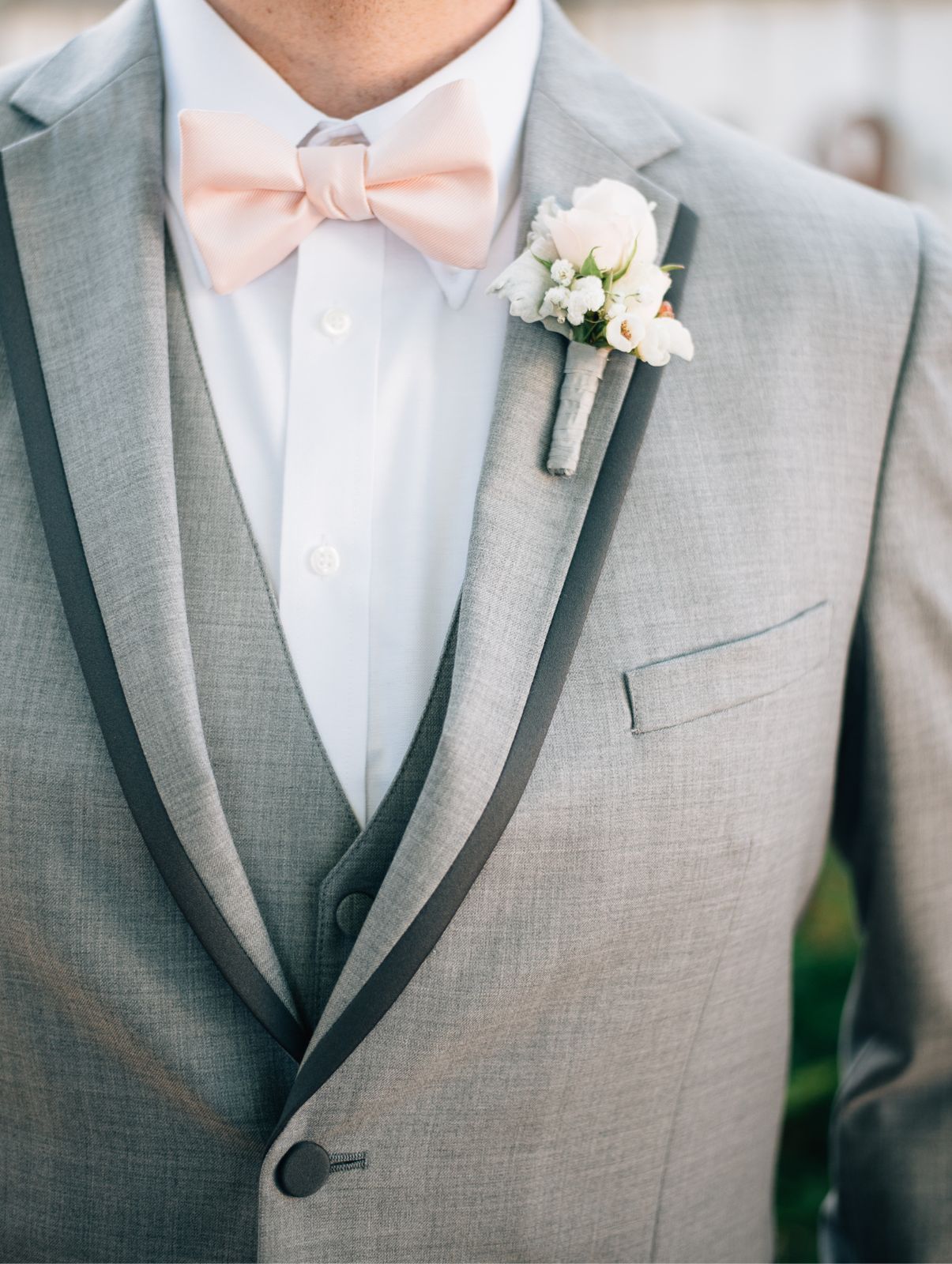 A bride and groom holding hands