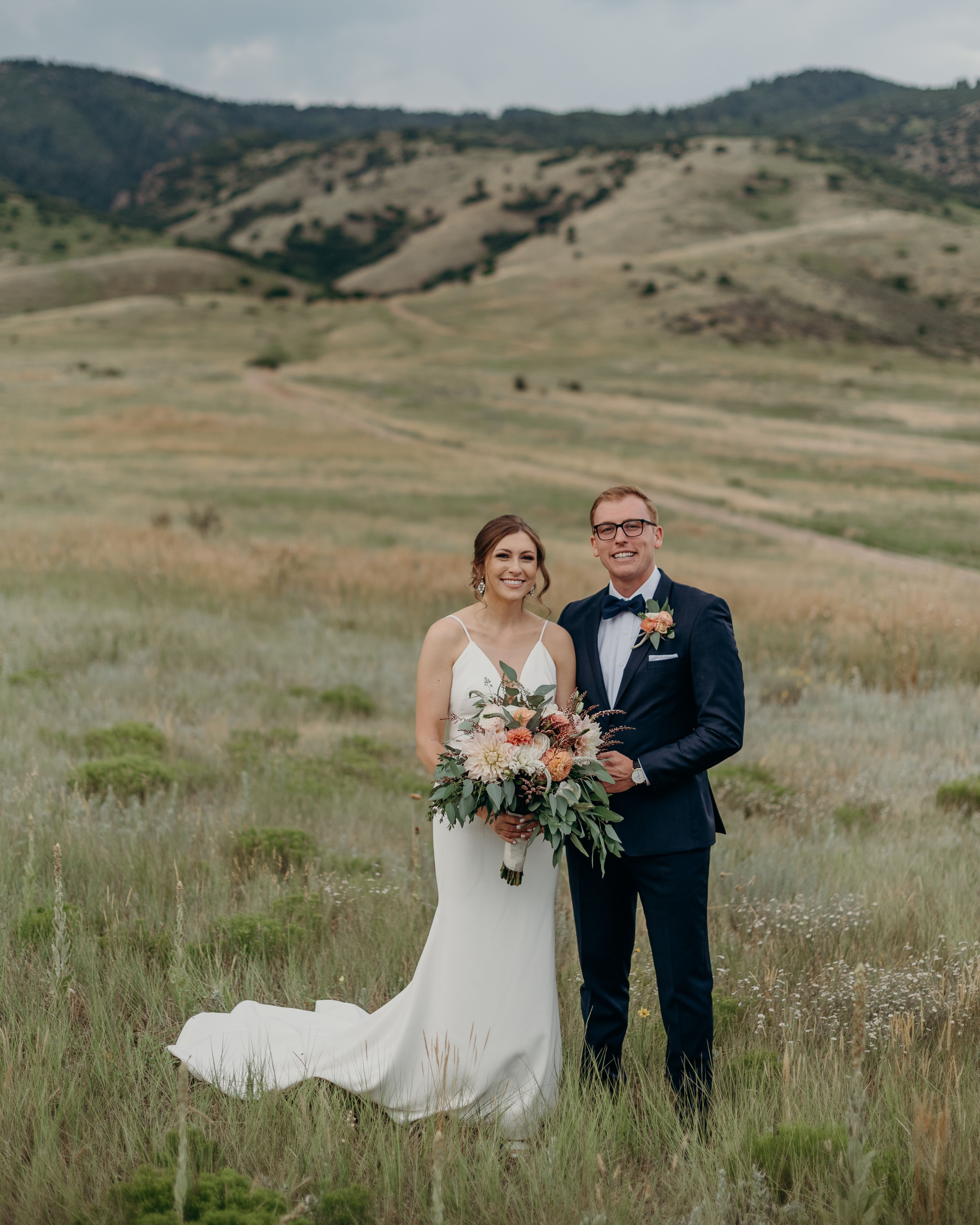 Bride and groom in navy suit