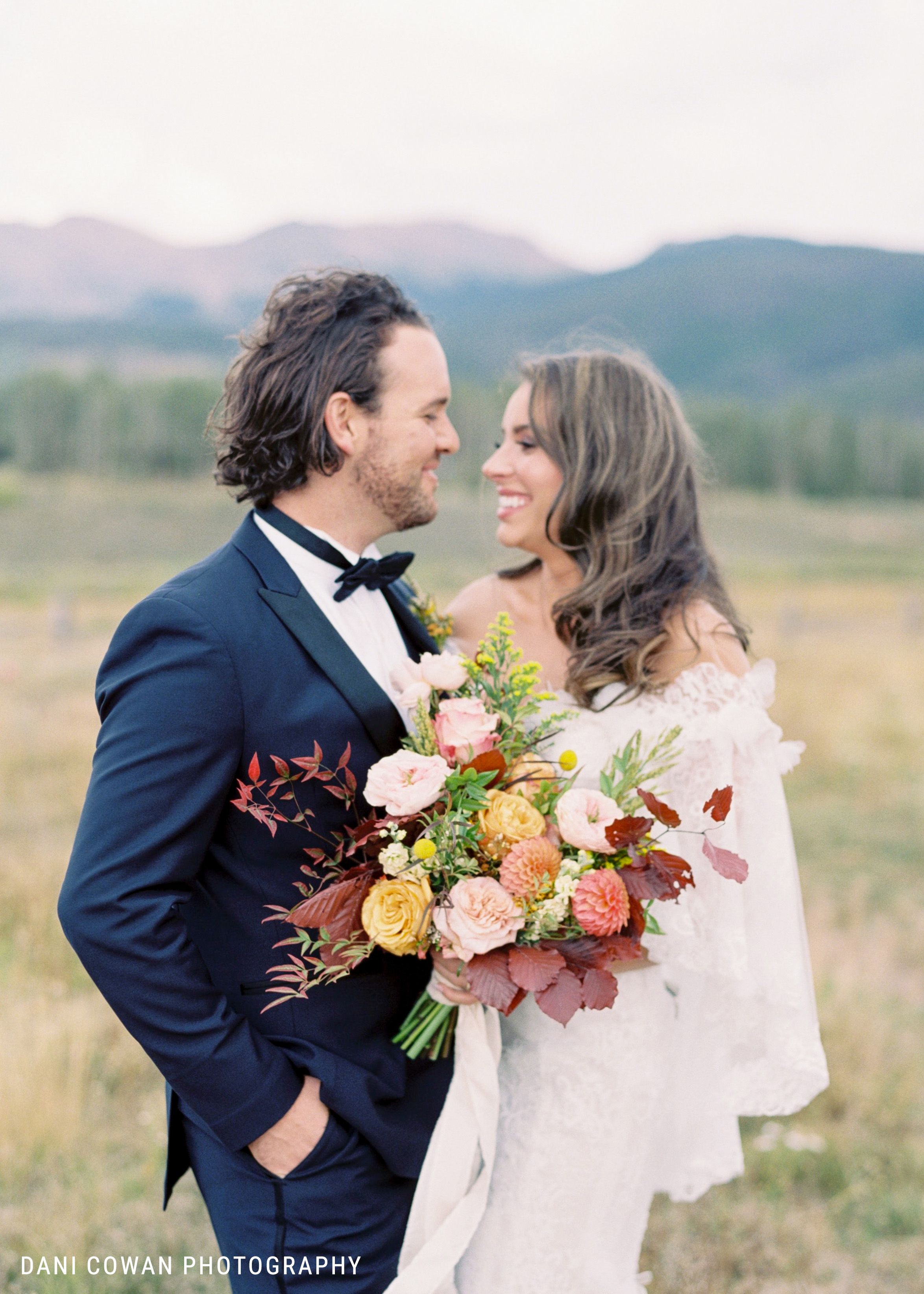 Bride and Groom in blue tuxedo