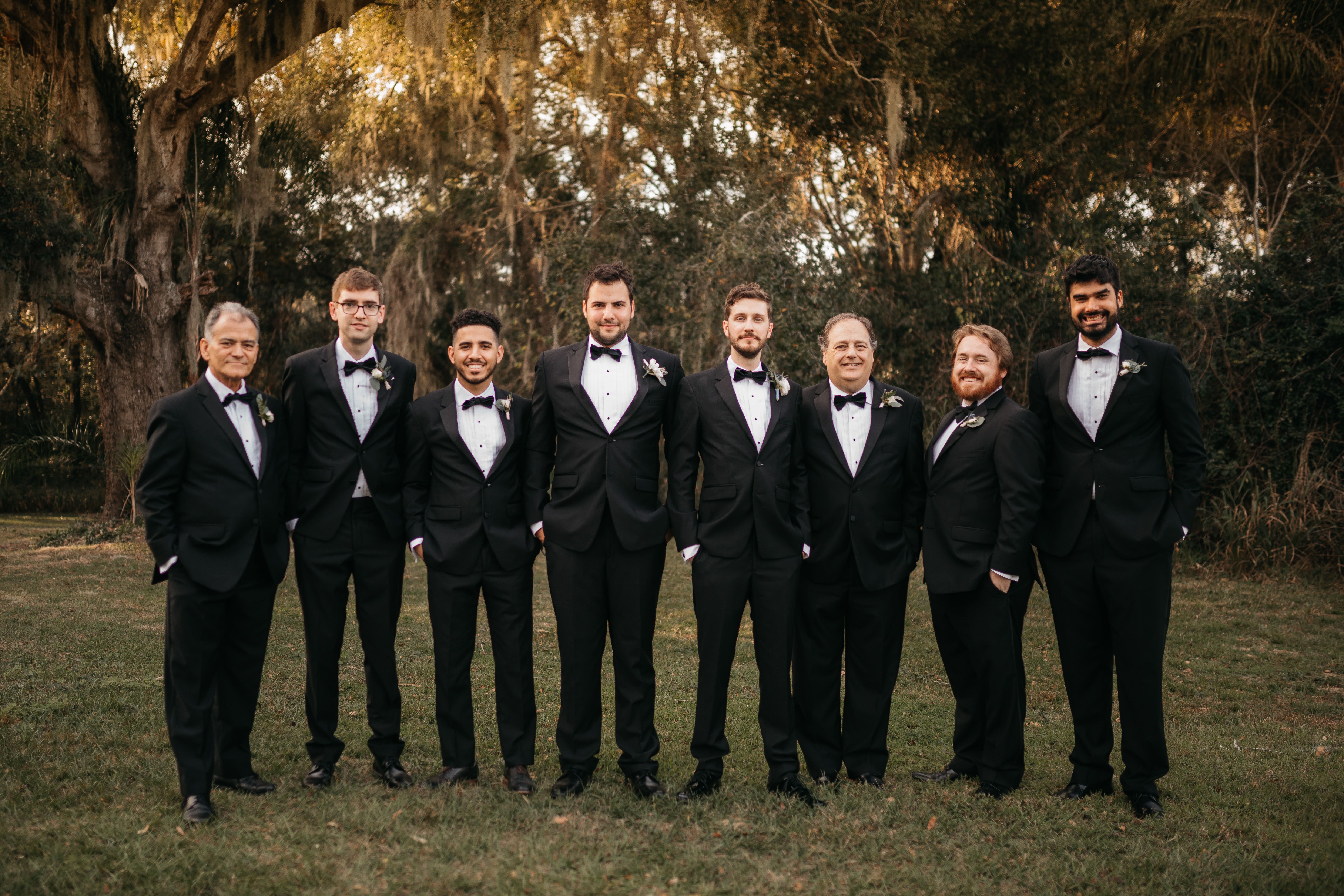 Groomsmen in black tuxedos 