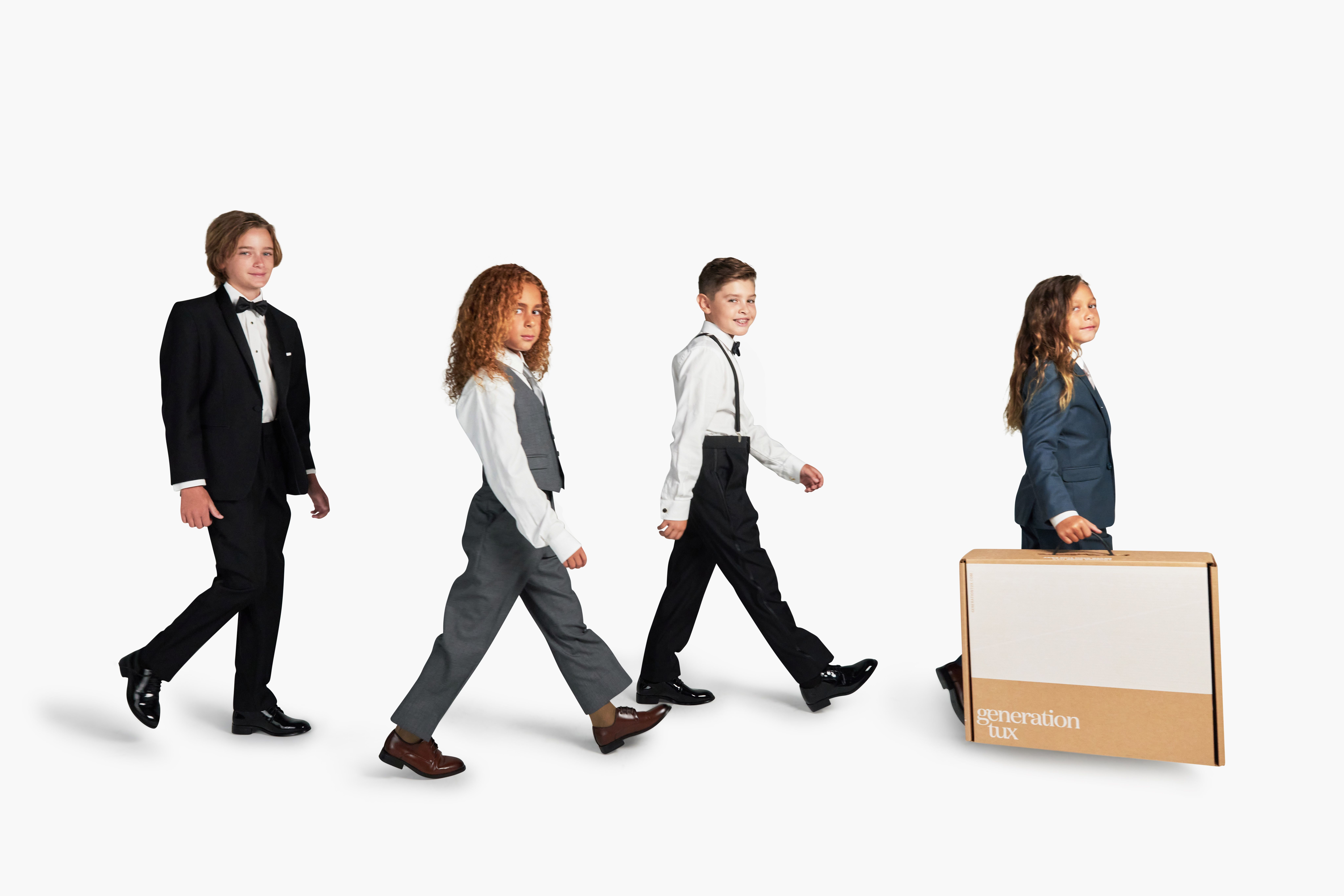 Kid models wearing Generation Tux suit and tuxedos available for rent online