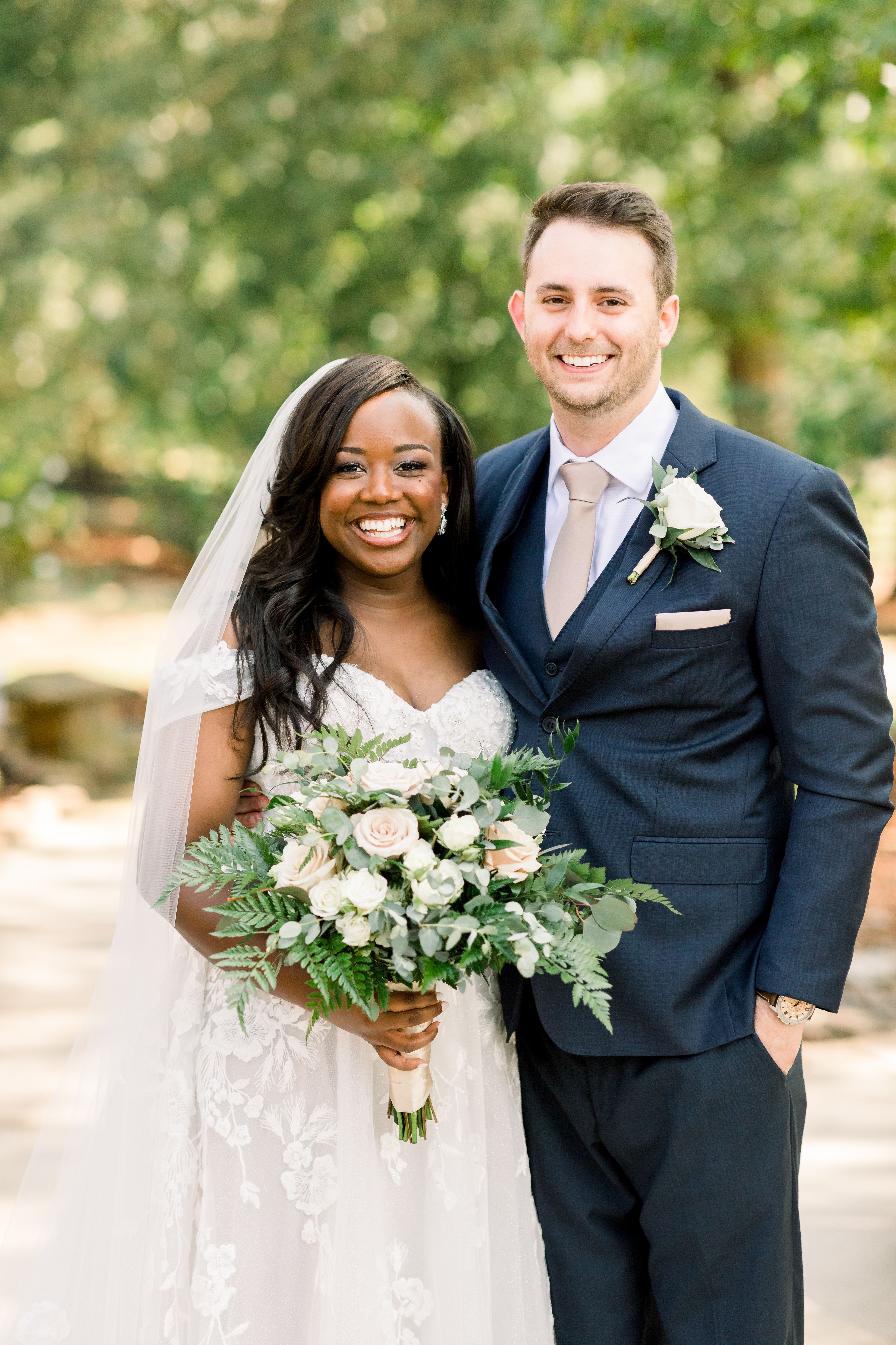 Bride and groom in navy suit