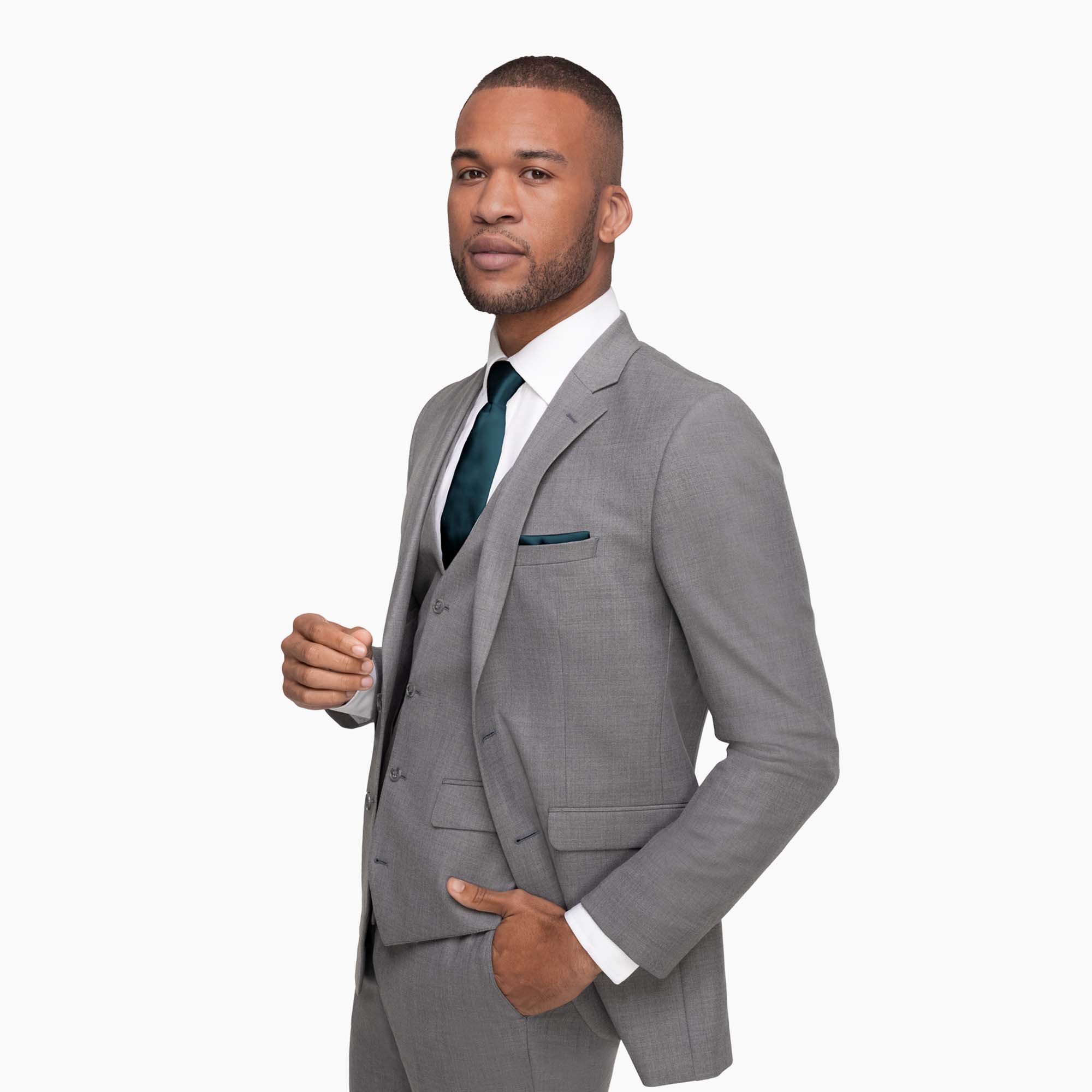 A man wearing the Allure Light Gray notch lapel suit